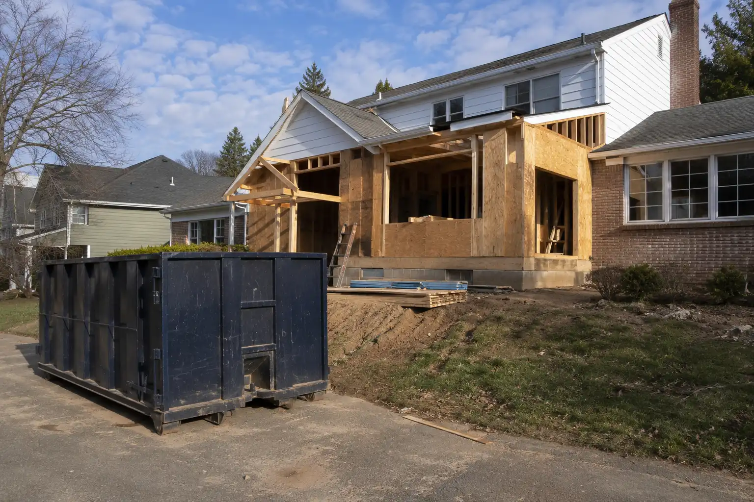 Large dumpster at a commercial renovation site